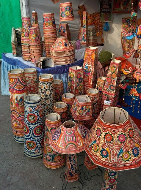 These lamps are made up of Goat leather, hand painted designs.  Art from andhra pradesh, india Tholu Bommalata Designs, Andhra Pradesh Aesthetic, Pakistani Handicrafts, Mehendi Props, Pakistani Crafts, Leather Lamps, Fabric Chandelier, Indian Room Decor, Hand Painted Designs