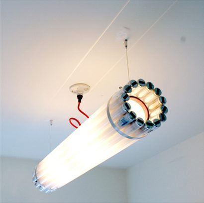 Light made from recycled ﬂuorescent tubes, powder coated steel and stainless steel banding and cable. Blitz Design, Fluorescent Tube Light, Tube Lamp, Linear Pendant Light, Fluorescent Tube, Pendant Light Design, Tube Light, Led Lampe, Lamp Design