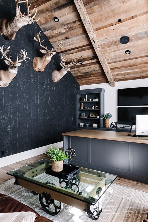 Black walls, a rustic wood ceiling and mounted taxidermy give the husband’s office a decidedly masculine vibe. Photography: Rebekah Westover Deisgn: Remedy Design Firm, Joe Carrick Chic Modern Farmhouse Living Room, Rustic Masculine Decor, Office With Deer Mounts, Masculine Home Office Ideas Rustic, Modern Trophy Room, Lodge Style Office, Black Walls Wood Ceiling, Mans Office Ideas, Modern Deer Mount