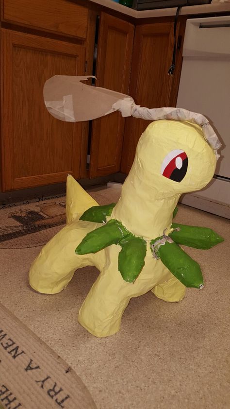 Paper mache Bayleef 1st Attempt, with a little damage from my little one who thought it would be fun to ride on Bayleef. Paper Mache Pokemon, Paper Mache Art, Paper Mache Crafts, Ride On, Paper Mache, Little One, Dinosaur Stuffed Animal, Pokemon, Paper Crafts