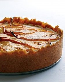 Maple syrup not only flavors this luscious cheesecake, but it also is brushed on thinly sliced pears that are broiled to create a very unique decoration atop this festive dessert. Maple Cheesecake, Cheesecake Fudge, Maple Desserts, Easy Potluck Recipes, Roasted Pears, Spring Form, Roasted Pear, Sliced Pears, Festive Desserts