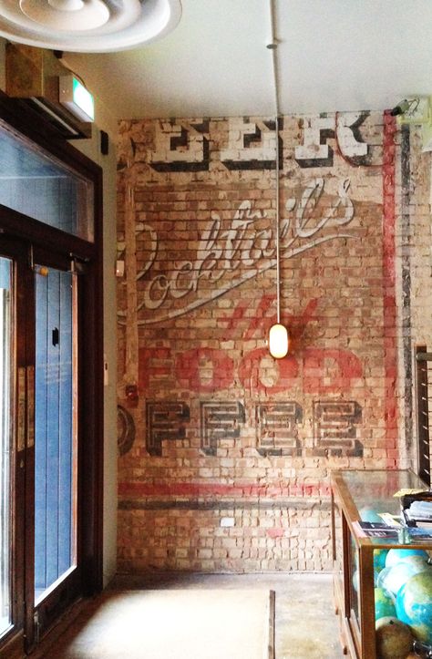 Brick wall mural, John Salt Brick Signage, Brick Wall Office, Steakhouse Restaurant Design, Brick Wall Mural, Sport Bar Design, Brick Cafe, Second Rodeo, Bar Decorations, Old Brick Wall