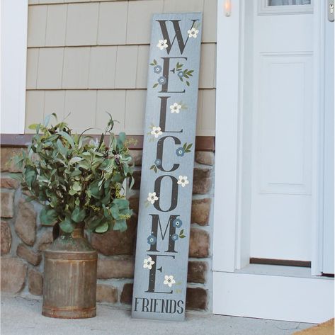 PRICES MAY VARY. Highest Quality Materials: This handcrafted Porch Board Hanging Welcome Sign and Porch leaner is made of a specially developed, 100% weatherproof, composite material that will not rot, warp, or fall apart with rain. It is printed with weatherproof UV Inks that won't fade, peel or crack. It measures 8"x 46.5"x .4, weighs 3.5 lbs. and is designed for both Outside and Inside home, door and porch decoration use. Beautifully Crafted Sign for Every Occasion: Our Friends with Flower ve Porch Leaner With Planter, Tall Welcome Sign, Welcome Sign Ideas, Spring Welcome Sign, Double Sided Welcome Porch Sign, Tall Porch Signs, Porch Sign, Vertical Porch Signs Diy, Porch Leaners