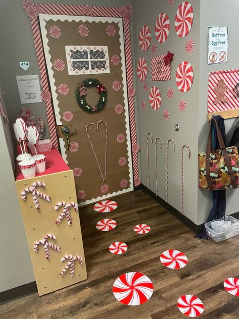 School christmas door decorations Candy Christmas Door Decorations, Pink Christmas Door Decorating Contest, Peppermint Door Decoration, Candy Cane Lane Christmas Decor Diy, Candy Cane Office Theme, Candy Cane Lane Hallway Decorations, Candy Land Door Decorations Classroom, Candy Cane Lane Door Decorations, Candy Cane Door Decorations For School