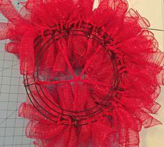 I have a friend who loves ladybugs, so I made these fun deco mesh ladybug hanging for her front door! I began with this 12 inch wire wreath form and secured red pipe cleaners across the center. These will be used for the body of the ladybug later. I used dollar store deco mesh in rolls that were 6 inches wide by 5 yards each. (I lost track of how many rolls I used). I cut my pieces in 8 inch pieces and rolled them into tubes. I took 3 tubes, pinched them in the middle and sec… Door Reef, Ladybug Wreaths, Diy Ladybug, Red Bug, Mesh Crafts, Spring Mesh Wreaths, Ladybug Wreath, Wire Wreath Forms, Wreath Burlap