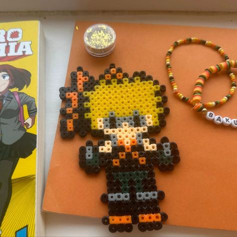 Isn't Bakugo in pixel form so cute! Why not explore my shop for simular items on my depop shop depop.com/cherie3charmzz. Which MHA character would you like to see next? Deku Perler Beads, Perler Beads My Hero Academia, Bakugo Perler Beads, Mha Perler Beads, Mha Pixel Art, Melt Beads, Easy Perler Beads Ideas, Beads Designs, Beads Ideas