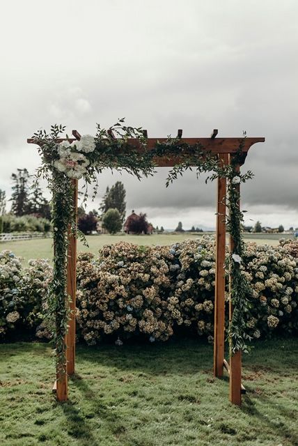 Simple Wedding Arch Garden Trellis Wedding Arch, Rustic Wedding Arch Flowers, Square Wedding Arbor, Archway Decor Wedding, Flowers On Arbor For Wedding, Wedding Lots Of Greenery, Minimalist Arbor Wedding, Simple Arch Flowers, Simple Greenery Wedding Arch