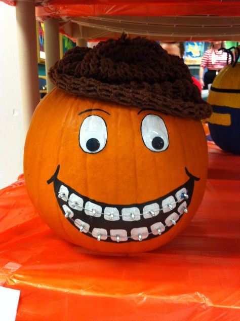 Pumpkin with braces Dental Pumpkin Painting Ideas, Pumpkin With Braces, Pumpkin Painting Ideas Dental, Dentist Pumpkin Ideas, Dental Pumpkin Decorating Contest, Dental Pumpkin Ideas, Silly Pumpkin, Scarecrow Contest, Story Book Pumpkin