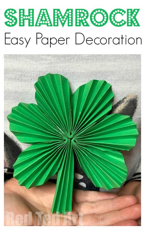 Paper Fan Shamrock Decorations - Happy St Patrick's Day! A great easy Paper St Patrick's Day decoration to make with the kids. Turn paper into fabulous Paper Fan Shamrocks. String them up as Paper Shamrock Garlands or hang them individually! addictive to make too! #Shamrocks #papercrafts #papershamrock #stpatricksday Shamrock Paper Craft, St Patrick’s Day Paper Crafts, Shamrock Decorations, Shamrock Crafts, Sant Patrick, Easy Paper Crafts For Kids, Shamrock Garland, Shamrock Craft, Fete Saint Patrick