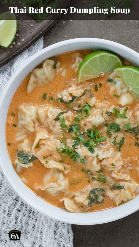 Spice up your soup game with this Thai Red Curry Dumpling Soup!  Featuring tender potstickers in a savory red curry broth scented with ginger and lemongrass, this soup is as comforting as it is exciting—perfect for spicing up your soup rotation. Weeknight easy and ready in less than 30 minutes. Get the recipe at SoupAddict.com. Thai Red Curry Soup, Curry Broth, Chicken Dumpling Soup, Coconut Curry Soup, Dumpling Soup, Soups Stews Chilis, Tasty Thai, Homemade Soup Recipe, Dumplings For Soup