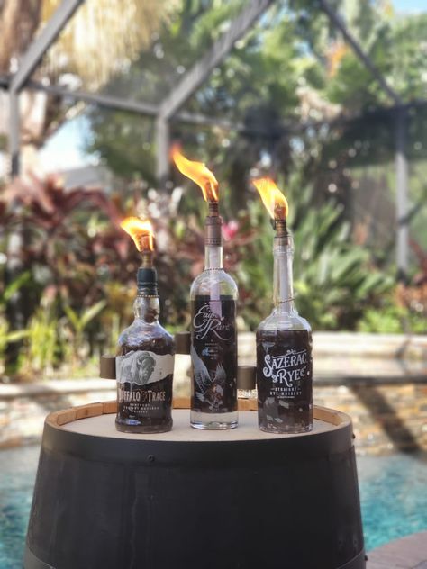 Bourbon Barrel Decor, Bottle Torch, Bourbon Bottle, Barrel Decor, Glass Fire Pit, Recycle Bin, Tiki Torches, Bottle Top, Crushed Glass