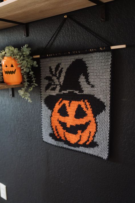 DIGITAL CROCHET PATTERN / PDF INSTANT DOWNLOAD  THIS LISTING IS NOT FOR A PHYSICAL ITEM.   This jack-o-lantern is waiting for you to bring it back to life. This is a perfect piece to hang if you're a weirdo like me, or as a cute gift.  Pattern is beginner/intermediate due to the color changing and includes right and left handed instructions. Must have basic crochet skills but I learned tapestry crochet as a beginner so don't be afraid, you will catch on quick!  PDF Pattern includes: Image chart Color blocking instructions Instructions for color changing Photo descriptions **includes left handed instructions. Finished product will be approximately 21x27.5 inches but will depend on your yarn size, tension, and hook size.  Materials needed: Acrylic or cotton worsted weight yarn (I use Caron O Crochet Ghost Wall Hanging, Spooky Crochet Tapestry, Crochet Halloween Potholders, Crochet Halloween Wall Hanging, Scream Crochet Grid, Horror Movie Crochet, Halloween Tapestry Crochet, Halloween Crochet Decor, Crochet Halloween Decor