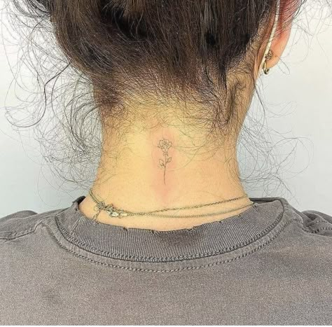 Small Rose Tattoo On Neck, Small Behind The Neck Tattoos, Fine Line Tattoo Back Of Neck, Minimalistic Neck Tattoo, Base Of The Neck Tattoo, Behind Neck Tattoo Woman Simple, Back Of Neck Tattoo Flower, Rose Back Of Neck Tattoo, Simple Back Of Neck Tattoo