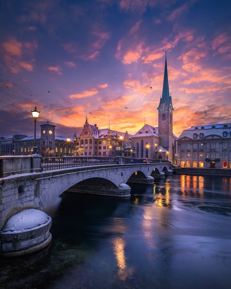 A warm colored winter sunset in the Old Town of Zurich overlooking Fraumunster Church. #zurich #switzerland #fraumunster #sunset #travel #travelphotography #photography #traveldestination Cities Reference, Zurich Switzerland Aesthetic, Zurich Switzerland Photography, Zurich Winter, Zurich Aesthetic, Switzerland Sunset, Eleven Minutes, Can Life, Switzerland Zurich