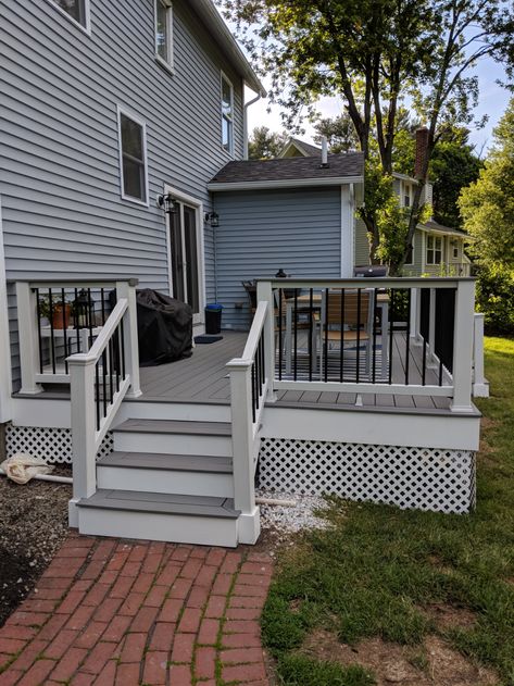 Trex Deck Ideas Color Schemes Gray, Beige House Deck Colors, Small Composite Deck Ideas, Composite Deck Ideas Layout, Trex Decking, Gray Trex Deck Ideas, Composite Deck With Skirting, White House With Trex Deck, Trex Deck Ideas Color Schemes