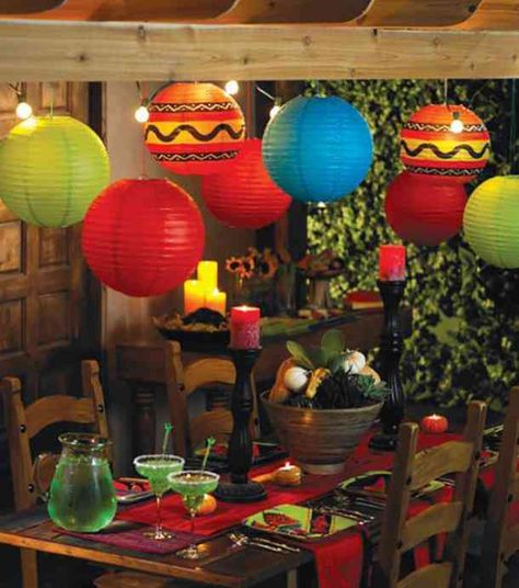 Colorful paper lanterns can be a cheap and easy way to decorate. #cincodemayo #decor #decoration #party #partyplanning #diyproject #DIY #decorationideas #flowers #fiesta #mexican #mexicanfood Mexico Party, Cinco De Drinko, Mexican Night, Mexican Fiesta Party, Mexican Birthday, Fiesta Theme Party, Mexican Party Theme, Taco Party, Fiesta Theme