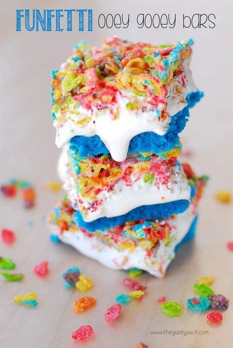 Reach for your favorite box of cereal and turn it into one of these amazing desserts! From no-bake Fruity Pebble cheesecake to Fruity Pebble stuffed cookies, you really can't go wrong with these 17 Must Have Fruity Pebble Desserts. #fruitypebbles #dessertrecipes #dessertideas #desserts #cereal #easydesserts #bestdesserts #bestdessertrecipes Fruity Pebble Bars, Ooey Gooey Bars, Cake Mix Cookie Bars, Dream Dessert, Fruity Pebble, Gooey Bars, Dessert Original, Torte Cupcake, Fruity Pebbles