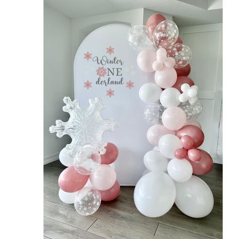 Welcome to Sweet Escapes By Debbie  This winter onederland DIY balloon garland is just the thing to make your little ones party special! This garland is a great way to add that pop to your party. Chose the length you would like at checkout. The garland includes white, pink, rose and clear with white snowflake balloons. Making your own backdrop has never been easier! With this complete kit you can make a beautiful statement piece that will wow your guests! The 6 foot garland is the perfect size t Winter Onederland Table Centerpieces, Pink Winter Wonderland Centerpieces, Winter Onederland Balloons, Snowflake Balloon Arch, Pink Winter Onederland Party, Winter Onederland Balloon Arch, Winter Onederland Centerpieces, Winter Wonderland Birthday Decorations, Winter Baby Birthday Party