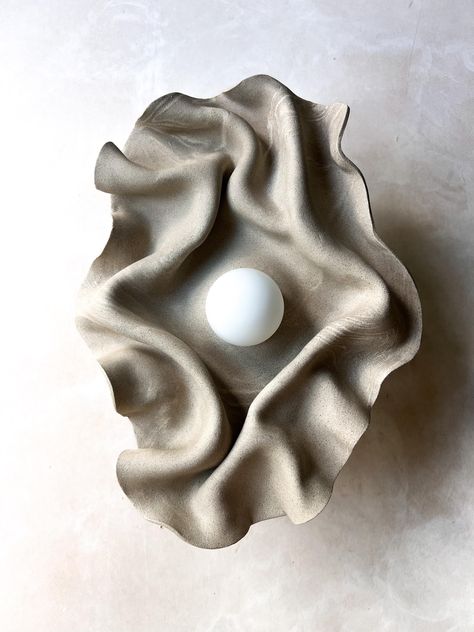 Brown Ceramic wall sconce, Sculptural ceramic wall light, ceramic lighting, unique wall light, brown wall light art THIS IS MADE TO ORDER. PLEASE ALLOW 5-7 WEEKS FOR ITEM TO  SHIP Handbuilt ceramic wall sconce with draped/folded  marbled stoneware clay, reminiscent of the natural world. Meticulously crafted by the artist, The nature of the technique used to shape the clay adds a touch of uniqueness to each piece. The sconce features a distinctive design with draped clay, evoking the graceful flo Unique Wall Lights, Ceramic Wall Lights, Ceramic Light, Clay Wall, Outdoor Sconces, Cozy Room Decor, Wall Sculpture Art, Clay Design, Organic Form