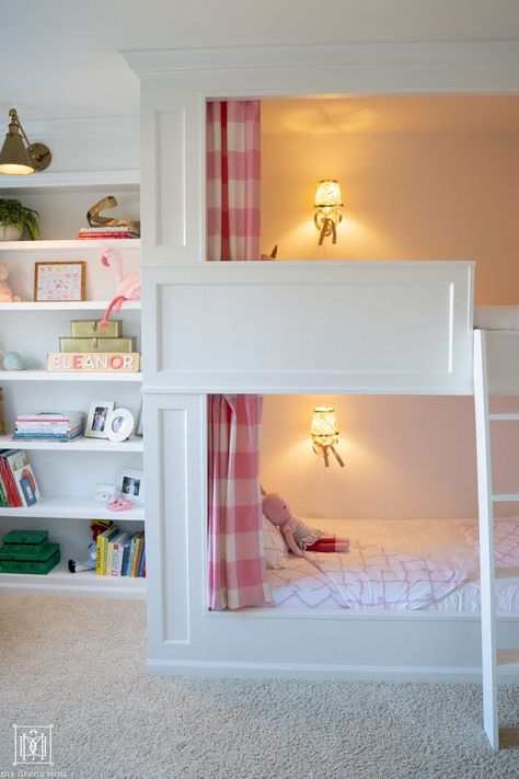 AMAZING DIY built-in bunk beds gorgeous with curtains, elegant design, and lighting make this the ultimate shared girls bunk room! This detailed tutorial shares everything you need to build your own--perfect for a cabin, a beach house, or shared siblings bedroom at home. Built In Bunk Beds With Curtains, Bunk Beds Lights, Sisters Bedroom Ideas Shared Rooms Bunkbed, Custom Made Bunk Beds, Elegant Bunk Beds, Built In Bed With Curtains, Custom Built Bunk Beds, Diy House Bunk Bed, Girls Bedroom Built Ins