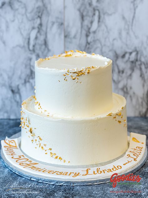 Gold Flakes On Cake, Gold Flakes Cake, White And Gold Cake Simple, Simple Two Tier Cake, Gold Flake Cake, Cake With Gold Flakes, New Years Cake, Gold And White Cake, Cake With Gold