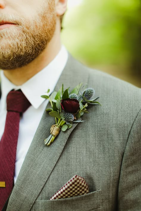 Boutinere Ideas, Boutinere Ideas Groomsmen, Dresses For Hot Weather, Burgundy Ranunculus, Thistle Boutonniere, Burgundy Accessories, Ranunculus Boutonniere, Mandap Decoration, Ranunculus Wedding