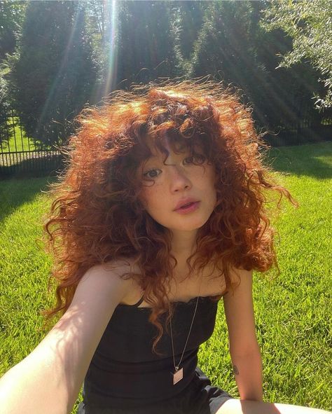 Curly Dark Ginger Hair, Ginger Curly Hair With Bangs, Dark Orange Curly Hair, Curly Hair Covering Eyes, Red Curly Hair Natural, Curly Red Hair With Bangs, Curly Red Hair Naturally, Natural Curly Red Hair, Red Head Curly Hair