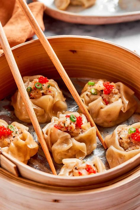 This Shrimp Shumai recipe features tender steamed dumplings stuffed with a savory blend of succulent shrimp and earthy mushrooms, plus fresh ginger and garlic. Enjoy this easy dim sum recipe at home, with soy sauce for dipping! Shrimp Shumai Recipe, Shumai Recipe, Shrimp Shumai, Dim Sum Recipe, Shrimp Stuffed Mushrooms, Dim Sum Dumplings, Dim Sum Recipes, Steamed Shrimp, Steamed Dumplings