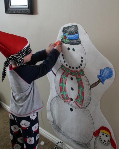 Pin the carrot on the snowman game. Pin The Carrot On The Snowman, Snowman Games, Winter Birthday Parties, Winter Birthday, The Snowman, Christmas Party, Christmas Stockings, Christmas Sweaters, Birthday Parties