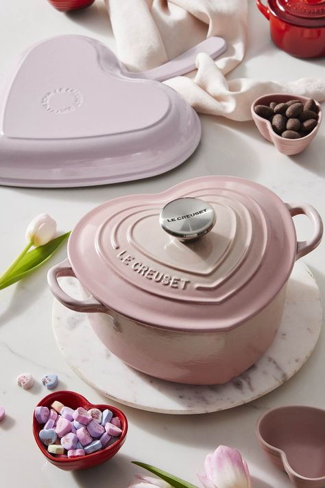 The Le Creuset Hearts Collection features Dutch Ovens, cocottes and kitchen accessories that have been fashioned into swoon-worthy heart shapes or topped with gold and silver heart knobs. Available in our passionate red Cerise, sweet Licorice black, and delicate Shell Pink colors, the collection is sure to warm hearts. Heart Shaped Le Creuset, Le Creuset Cocotte, Heart Dutch Oven, Le Creuset Aesthetic, Pink Kitchenware, Pink Kitchen Inspiration, Pink Le Creuset, Le Creuset Heart, Le Creuset Pink