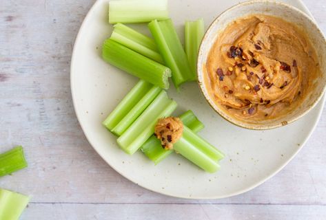 Keto Celery and Spicy Peanut Butter Dip | Carb Manager Keto Celery, Celery Snacks, Spicy Peanut Butter, Peanut Butter Dip, Carb Counter, Smooth Peanut Butter, Diet Tracker, Tamari Sauce, Keto Peanut Butter