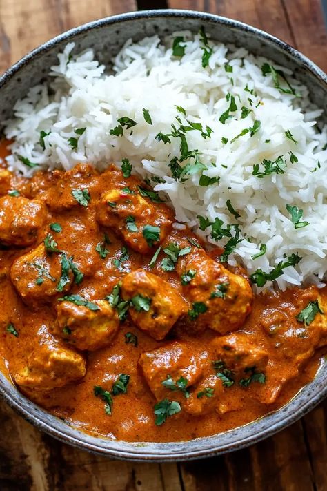 Chicken Tikka Masala is a popular dish of roasted marinated chicken chunks in spiced curry sauce. It’s rich, flavorful, and a favorite in Indian cuisine. Gourmet Indian Food, Chicken Tiki Masala, Indian Chicken Tikka Masala, Nyc Thanksgiving, Indian Chicken Dishes, South Asian Food, Chicken Masala Recipe, Greek Grilled Chicken, Indian Chicken Curry