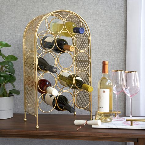 Showcase Your Wine With Elegance. The Striking Latticework Of This Wine Rack Brings Lush Texture And Elevated Glamour To Any Home. -Cast Iron -Holds 14 Standard Bottles -12" Long X 7" Deep X 22.8" High - Care Instructions: Hand Wash Recommended - Primary Material: Iron Product Specifications: - Elegant Tabletop Wine Rack - This Luxurious Wine Bottle Holder Looks Right At Home In Any Vintage-Styled Kitchen, Or On Any Metal Bar Cart. The Airy, Open Frame With Delicate Latticework Brings Lush Textu Twine Trellis, Gold Countertop, Wine Bottle Dimensions, Tabletop Wine Rack, Home Bar Essentials, Metal Bar Cart, Table Top Wine Rack, Wine Bottle Rack, Bar Essentials