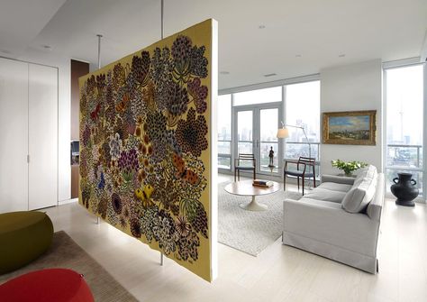 https://www.contemporist.com/floating-room-divider-is-used-to-display-artwork-in-this-apartment/ Wall Room Divider, Creative Room Dividers, Wall Divider, Divider Ideas, Diy Room Divider, Light Hardwood Floors, Hall Interior Design, Hall Interior, Room Divider Screen