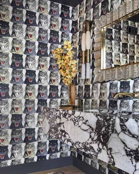 Architectural Digest on Instagram: “In the L.A. house of @mileycyrus, tiger face Gucci wallpaper was the inspiration for a powder room’s design. “Miley had told me that when…” Miley Cyrus House, Tish Cyrus, Amangiri Resort, Murano Glass Mirror, Blue Sectional, Tiger Wallpaper, Bold Wallpaper, Marble Vanity, Milo Baughman