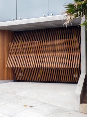 Bi-folding garage door // Folding Garage Doors, Unique Garage Doors, Best Garage Doors, Modern Garage, Into The Wood, Door Inspiration, Door Insulation, Design Blogs, Garage Design