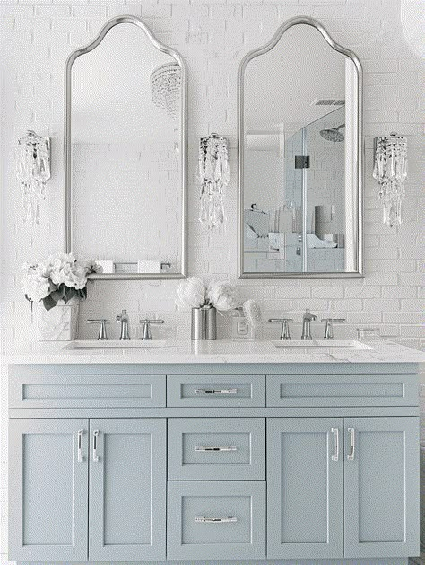 27 Blue Bathroom Ideas [With Pictures] White Vanity Mirror Bathroom, White Blue Bathroom Ideas, Teal White Bathroom, White Grey And Blue Bathroom, Blue White Powder Room, Light Blue Bathroom Vanity Ideas, Bathroom Blue And Grey, Ice Blue Bathroom Ideas, Pale Blue Bathroom Ideas