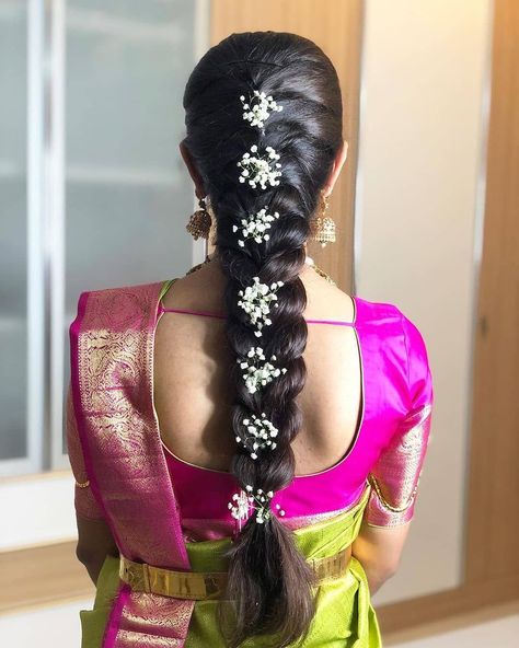 Getting all excited and nervous as the D-Day is approaching and so much to do in little time. Fashion comes full circle, so it seems like the Gajra is back. Hence, why not try wearing Gajra instead of hair ornament or style both together. We are here to help you out by helping you as we've come up with more than 15 Gajra Hairstyles that you can simply flaunt on your D-Day. Floral Hairstyles, Indian Hairstyles For Saree, South Indian Wedding Hairstyles, Bridal Hair Decorations, Bridal Hairstyle Indian Wedding, Hair Style On Saree, Saree Hairstyles, Engagement Hairstyles, Bridal Hairdo