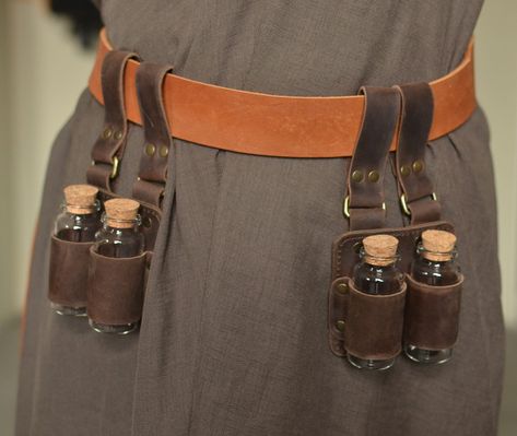 One or two pieces of brown leather potion holders (at your choice)  Made of genuine leather and original fittings, which gives the product an authentic look. The one piece includes 2 glass bottles with a cork stopper (30 ml = ~1 oz).  The size of the loop allows you to put the holder on a belt up to 45 mm (1 2/3") wide. The holder can be used for its intended purpose,  in role-playing games in the style of steampunk or Victorian style as well as alchemy or witchcraft. Feel free to contact us in Larp Diy, Steampunk Belt, Ren Faire Outfits, Diy Leather Projects, Larp Costume, Concept Clothing, Leather Projects, Belt Accessories, Workout Accessories