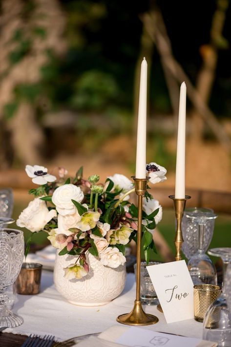 Brass Candlesticks and Ranunculus and Anemone Centerpieces Brass Wedding Decor, Anemone Centerpiece, Glass Wedding Centerpieces, Milk Glass Centerpiece, Blush Centerpiece, Brass Wedding, Beautiful Wedding Centerpiece, Winter Wedding Centerpieces, Candlestick Centerpiece