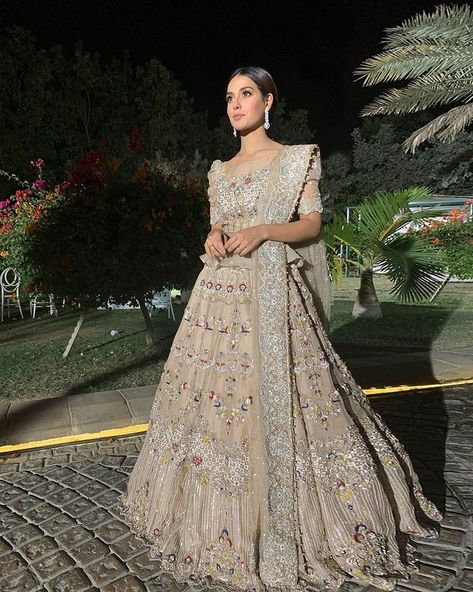 Faiza Saqlain on Instagram: “Uber talented @iiqraaziz looks magnificent in Naurattan. A beige tulle lehnga and puffy-sleeved choli. The set is rendered with sequins…” Faiza Saqlain, Khuda Aur Mohabbat, Indian Wedding Lehenga, Trending Wedding, Wedding Lehenga Designs, Iqra Aziz, Latest Bridal Dresses, Frock Fashion, For The Record