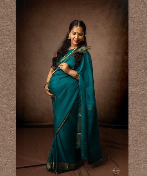 ✨ Embracing the timeless beauty of motherhood with a touch of tradition. 🌺 This stunning mom-to-be radiates joy and grace in her traditional attire, capturing the essence of Indian heritage. Every moment is a celebration of life and love, wrapped in the warmth of tradition. Here’s to cherishing these precious times forever. ❤️✨ Godh Bharai Outfit Indian, Indian Maternity, Beauty Of Motherhood, Maternity Photography Poses Couple, Maternity Photography Poses Pregnancy Pics, Maternity Photography Outdoors, Maternity Photoshoot Outfits, Baby Shower Photography, Pre Wedding Photoshoot Outdoor