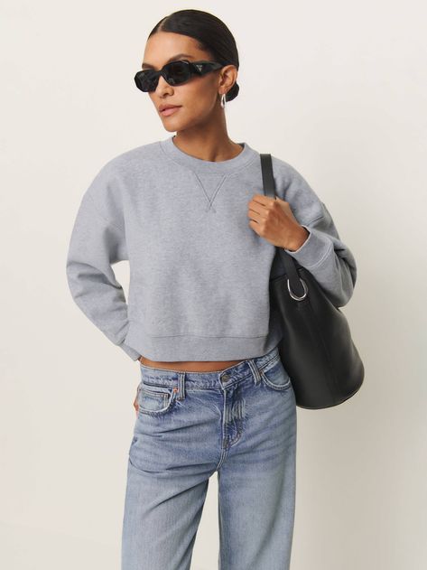 Shop the Grace Cropped Vintage Oversized Crewneck Sweatshirt from Reformation, a cropped, oversized sweatshirt with a crew neckline.