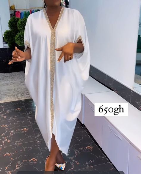 White silk kimono boubou dress with gold trimming design in front White Bubu Gown Styles Silk, White Bubu Gown Styles, White Bubu Gown, Bubu Gown Styles Silk, White Kimono Dress, Owambe Styles, Boubou Dress, Bubu Gown, Silk Kaftan Dress