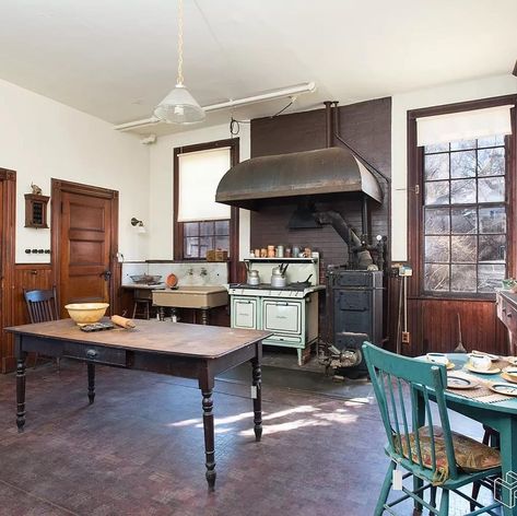 Image may contain: table and indoor House With Stables, Charles Shultz, Historic Kitchen, Efficient Kitchen, Historical Homes, Narrow Shelves, Montclair Nj, Industrial Style Kitchen, Living Hall