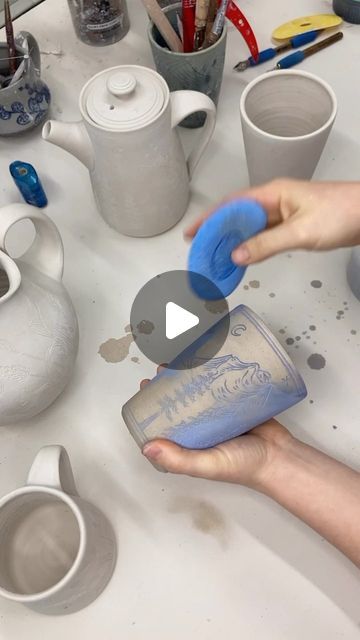 Ayla Mullen on Instagram: "Here's a glimpse into my inlay process✨  This video shows how I add color to most of my work using a traditional inlay technique called Mishima. I start with a bone dry pot that I've carved a design into at an earlier point. First, I cover the piece in underglaze, making sure to get color down into all the crevasses of my carved design. Then, I begin wiping away the color from the surface of the pot, revealing the carved design now filled in with color. It took meany years to get a consistent and cleanly inlaid design, especially since I do this process on stoneware clay rather than porcelain, meaning I have to work around the natural grittiness of the clay body.   Some tips for trying Mishima: make sure you introduce as little water as possible to the process at Inlay Ceramics, Mishima Ceramics, Underglaze Techniques, Pottery Stamp, Pottery Videos, Pottery Designs, Clay Projects, Stoneware Clay, Art Ideas