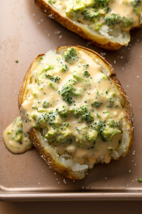 Cheesy Baked Potatoes with Broccoli Cheese Sauce Broccoli And Cheese Baked, Cheesy Baked Potatoes, Broccoli Cheese Sauce, Baked Potato With Cheese, Cheesy Broccoli Rice Casserole, Crock Pot Baked Potatoes, Cheese Sauce For Broccoli, Cheesy Broccoli Rice, Perfect Baked Potato