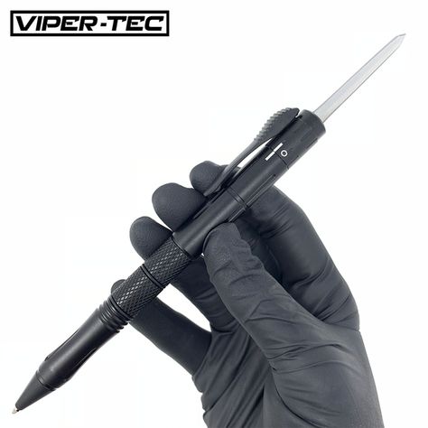 VT Tactical OTF Pen (Pre ORDER) - VT Tactical OTF Pen (Pre ORDER) - This sleek yet durable design offers the user a very easy to use, Out the Front (OTF) tactical pen. This pen is one of a kind, and will only have limited numbers produced.  Sharpened on both ends perfect for opening letters, and or slicing small objects. Included is a safety feature to prevent accidental discharge. Extra ink cartridge included. Blade Length: 4.8cm / 1.7 in Pen Length without blade: 6in / 16cm  . PRE ORDERS Blade City, Ergonomic Pen, Pen Knife, Survival Stuff, Instagram Contest, Tac Gear, Butterfly Knife, Tactical Pen, Automatic Knives