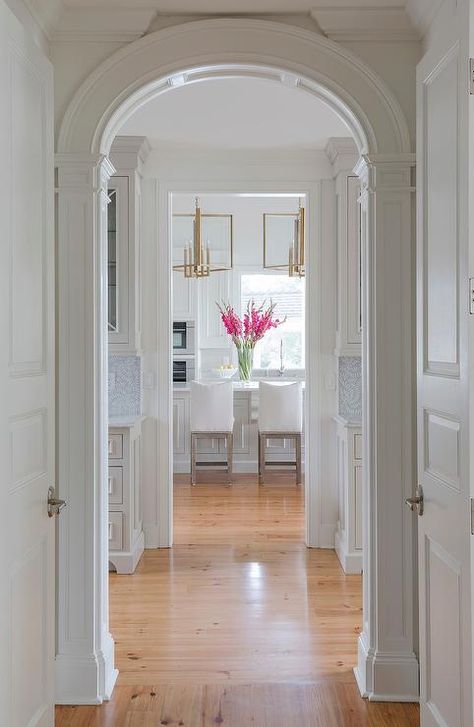 Modern Glam Bedroom, White Foyer, French Arch, Arched Front Door, Arched Doorways, Barber Shop Interior, Second Floor Balcony, Light Wooden Floor, Staircase Runner