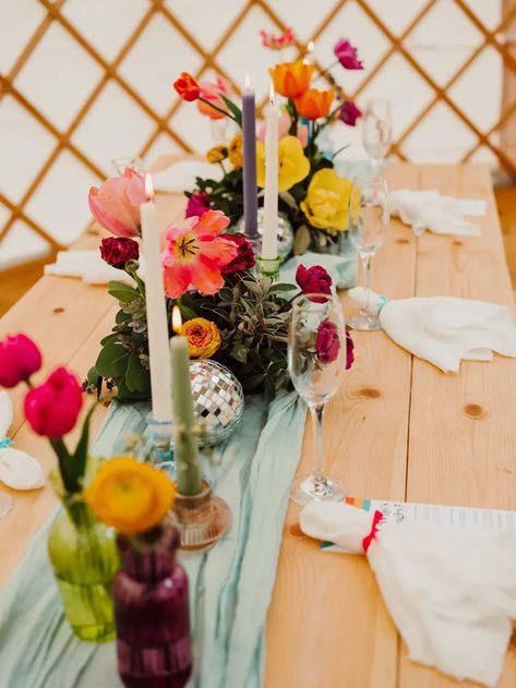 Colourful Spring Flowers Table Decor Disco Ball Festival Yurt Wedding Scott Carney Photography #wedding #weddingflowers Colourful Spring Wedding, Bright Wedding Table Settings, Wildflower Disco Ball Wedding, Disco Ball Wedding Decor Table, Flowers And Disco Balls, Wildflower Disco Wedding, Disco Ball Wedding Decor, Picnic Party Decorations, Colorful Table Setting